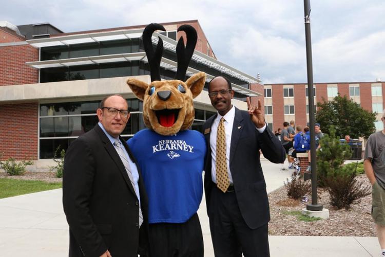 Dean of Student Affairs Gilbert Hinga with Louie at Move in